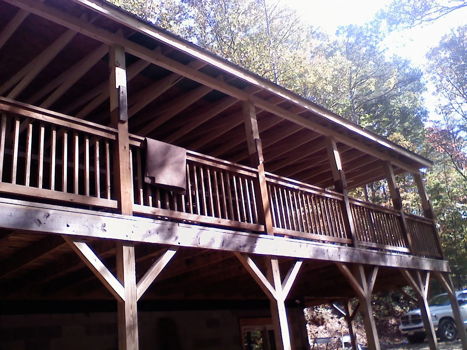 Timber framing under a new elevated porch and deck — Roof Leak Repair in Cascadia by Roofing Brothers